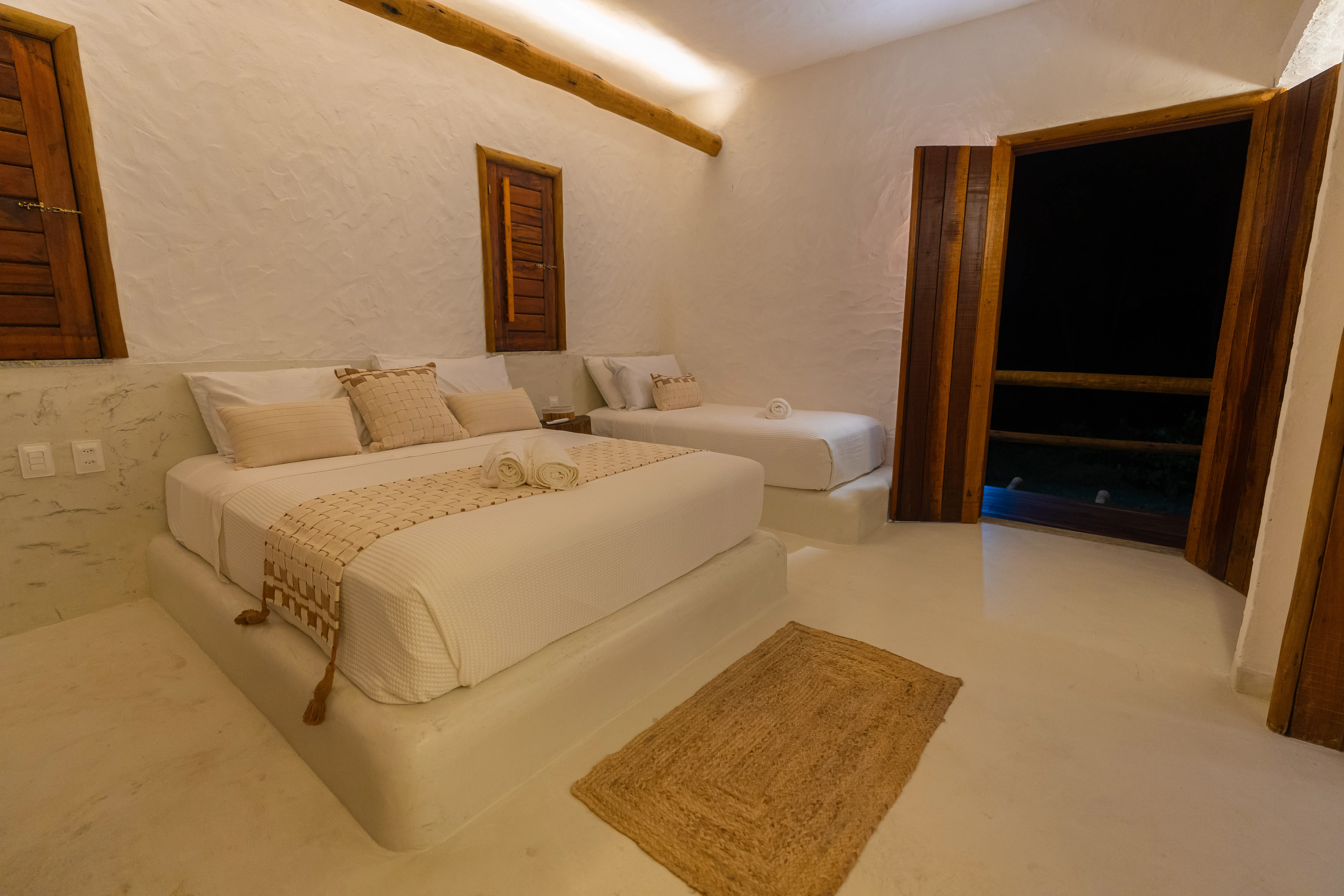 Quarto da Casa Areia com iluminação indireta